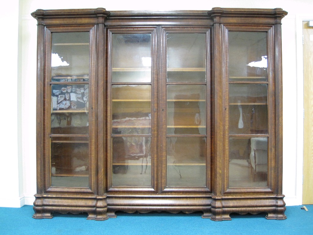 Appraisal: A Victorian mahogany inverted break-front Bookcase with adjustable shelves four