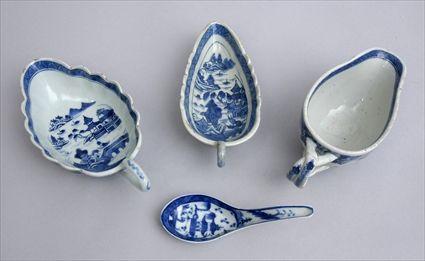 Appraisal: THREE CANTON BLUE AND WHITE SAUCE BOATS AND A SPOON