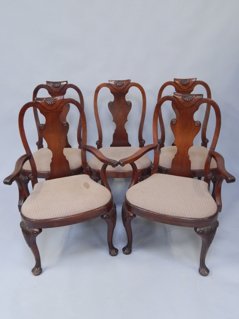 Appraisal: A set of eight American walnut dining chairs made by