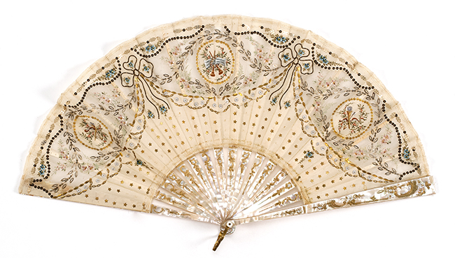 Appraisal: SILK AND MOTHER-OF-PEARL FOLDING FAN French th CenturySilk leaf with