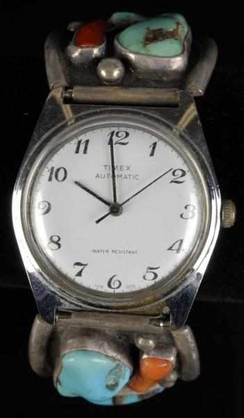 Appraisal: Timex Native American Indian Men's Watch Description Working Two sections