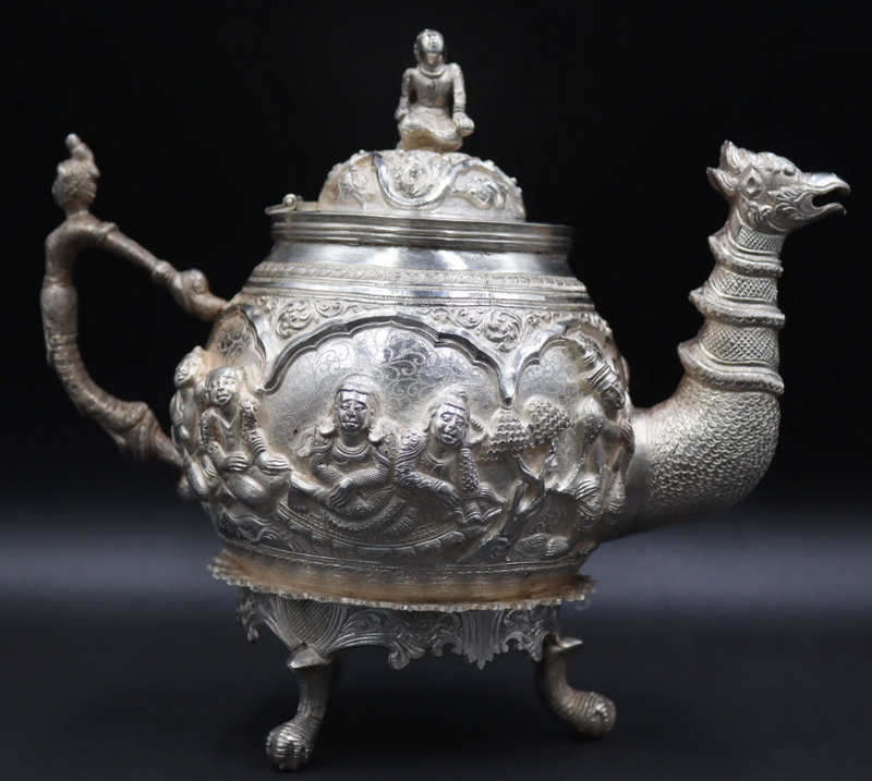 Appraisal: SILVER Asian Silver Figural Repousse Teapot Asian silver footed repousse