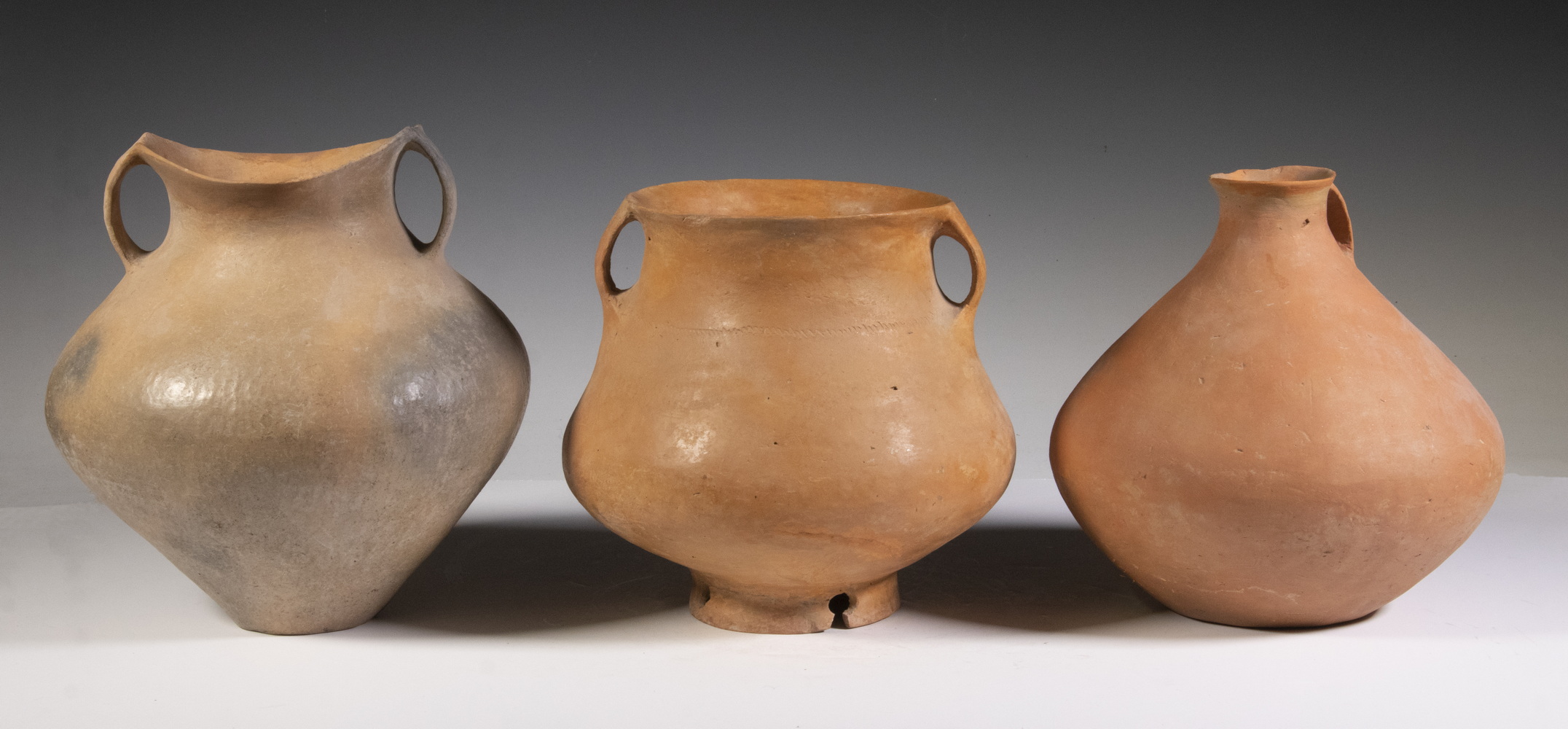 Appraisal: CHINESE NEOLITHIC TERRACOTTA POTTERY LIQUID VESSELS SIWA LATE YANGSHAO CULTURE