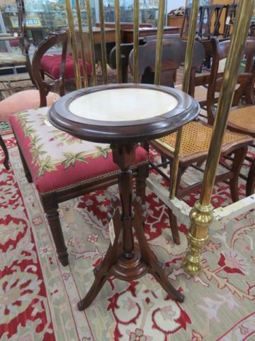 Appraisal: Carved Mahogany Plant Stand marbleinset Eastlake style tall