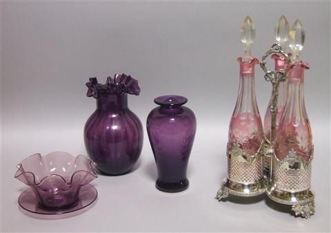 Appraisal: A ROGERS SMITH CO PLATED BOTTLE CADDY AND THREE DECANTERS