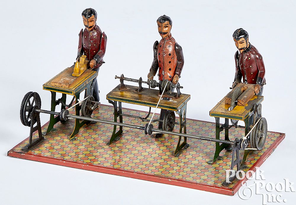 Appraisal: Carette three man workshop steam toy accessory Carette painted and