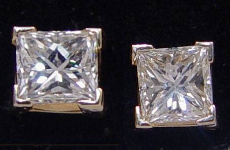 Appraisal: CT PRINCESS CUT DIAMOND STUD EARRINGS K yellow gold solitaire