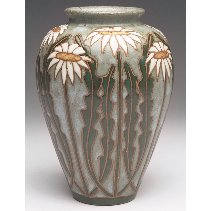 Appraisal: Common Ground Pottery vase contemporary daisies against a mottled blue