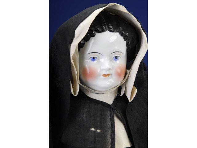 Appraisal: Large China Nun Doll Germany ca glazed porcelain shoulder head