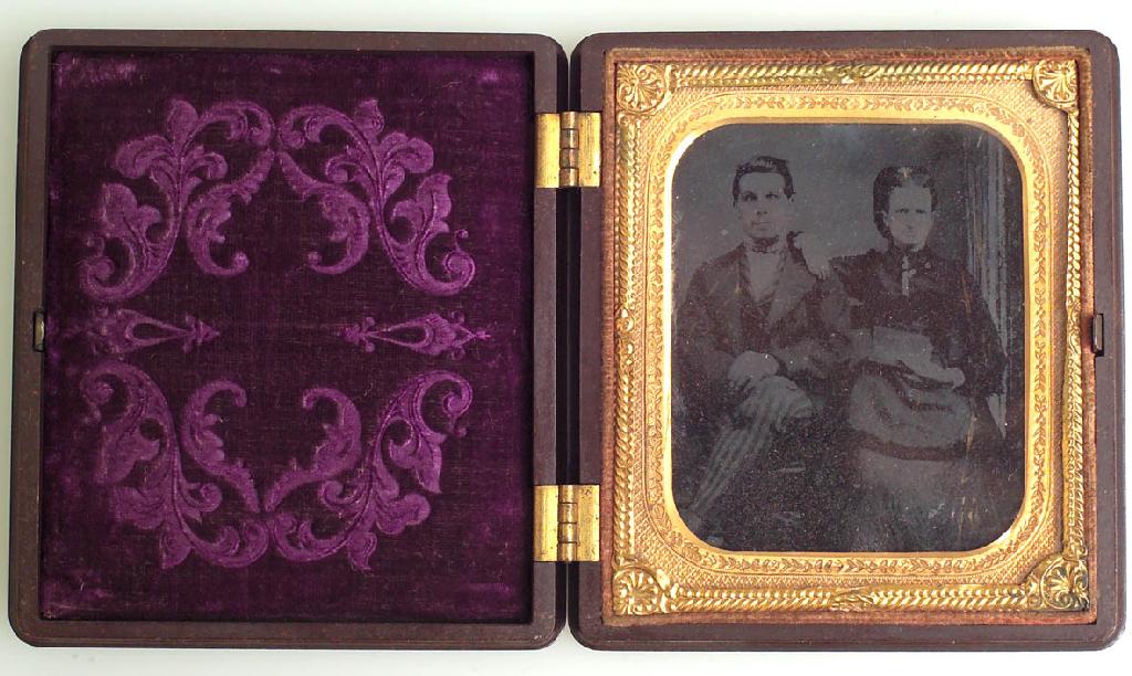 Appraisal: VICTORIAN PORTRAIT DAGUERROTYPE of a couple in its original velvet-lined