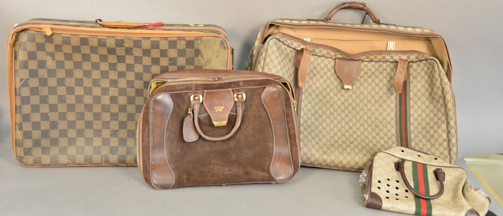 Appraisal: Four travel bags Gucci travel bags brown leather case mod