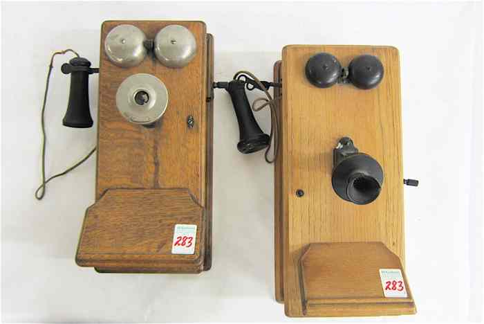 Appraisal: TWO AMERICAN OAK WALL TELEPHONES a Stromberg-Carlson and another by