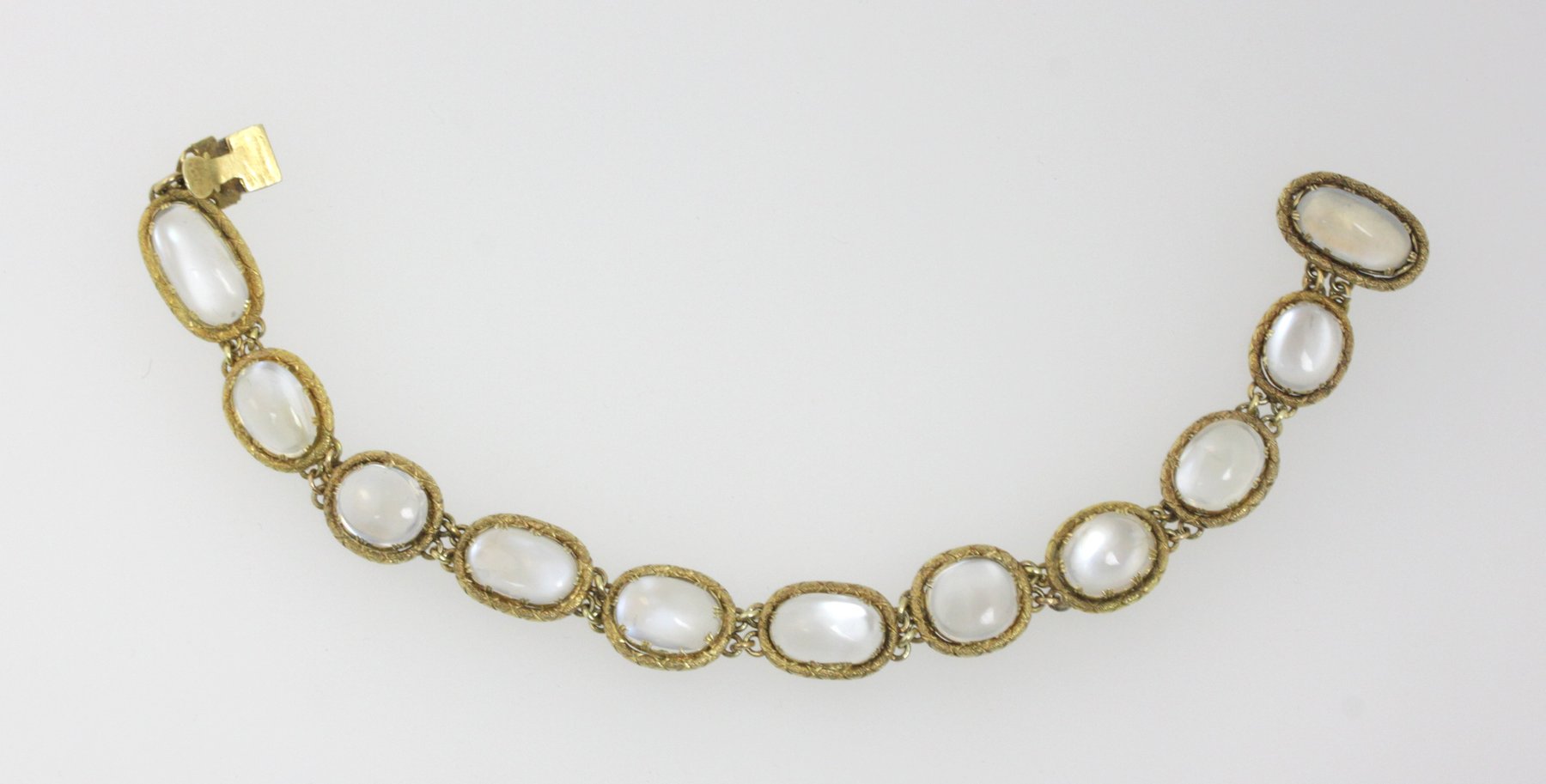 Appraisal: A moonstone bracelet the eleven links of varying size in