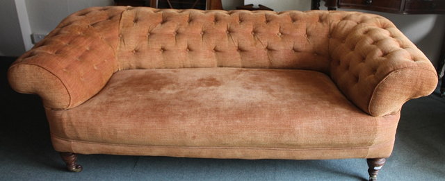 Appraisal: A LARGE VICTORIAN BUTTON UPHOLSTERED CHESTERFIELD SOFA on turned supports