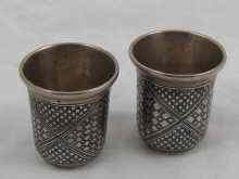 Appraisal: A pair of Russian silver vodka tots with niello decoration