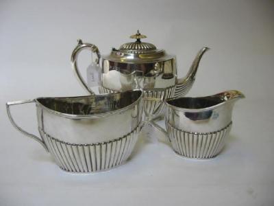 Appraisal: A COMPOSITE THREE PIECE TEA SERVICE maker John Round Sheffield