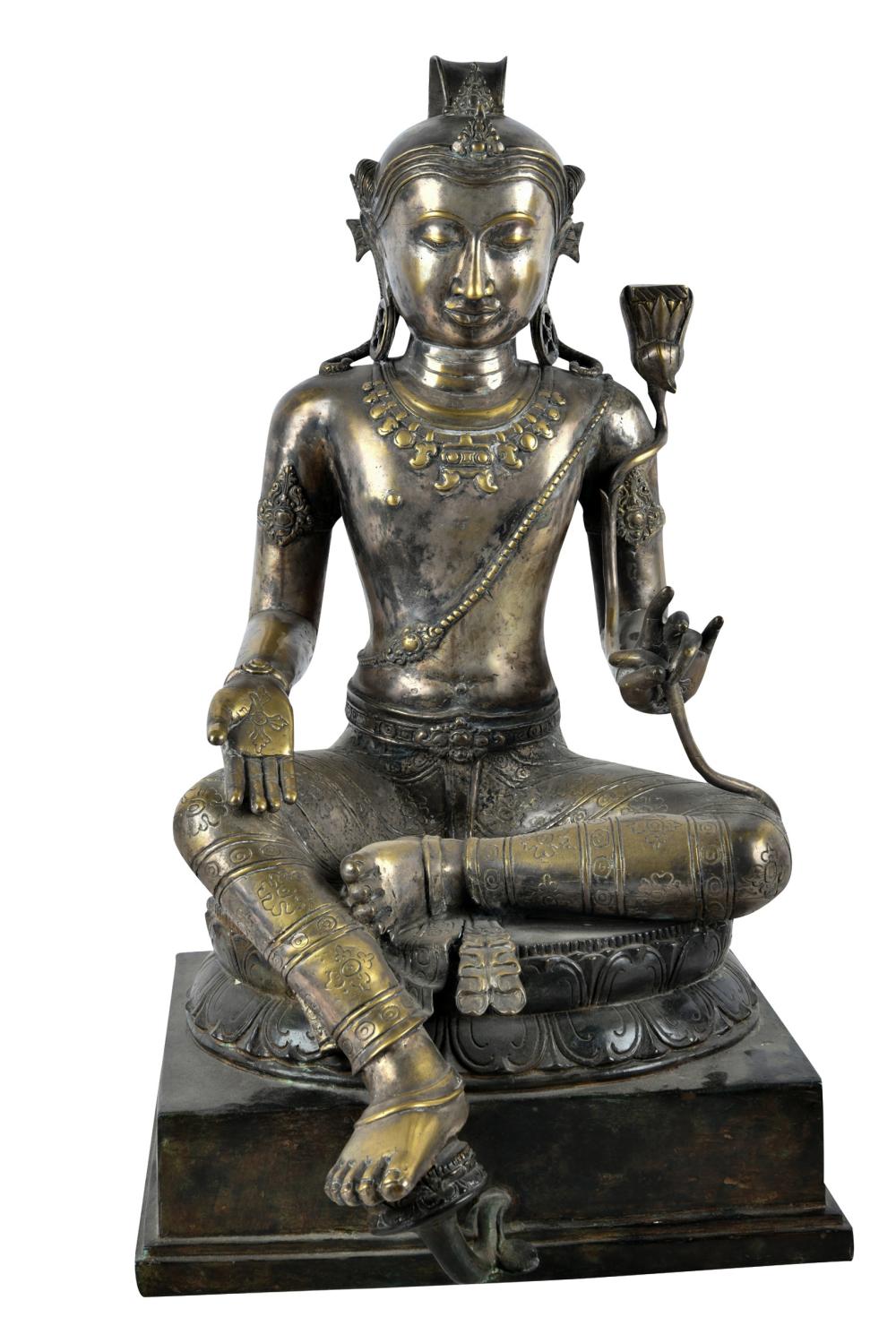 Appraisal: ASIAN CAST METAL FIGURE OF A DEITYon an integral metal