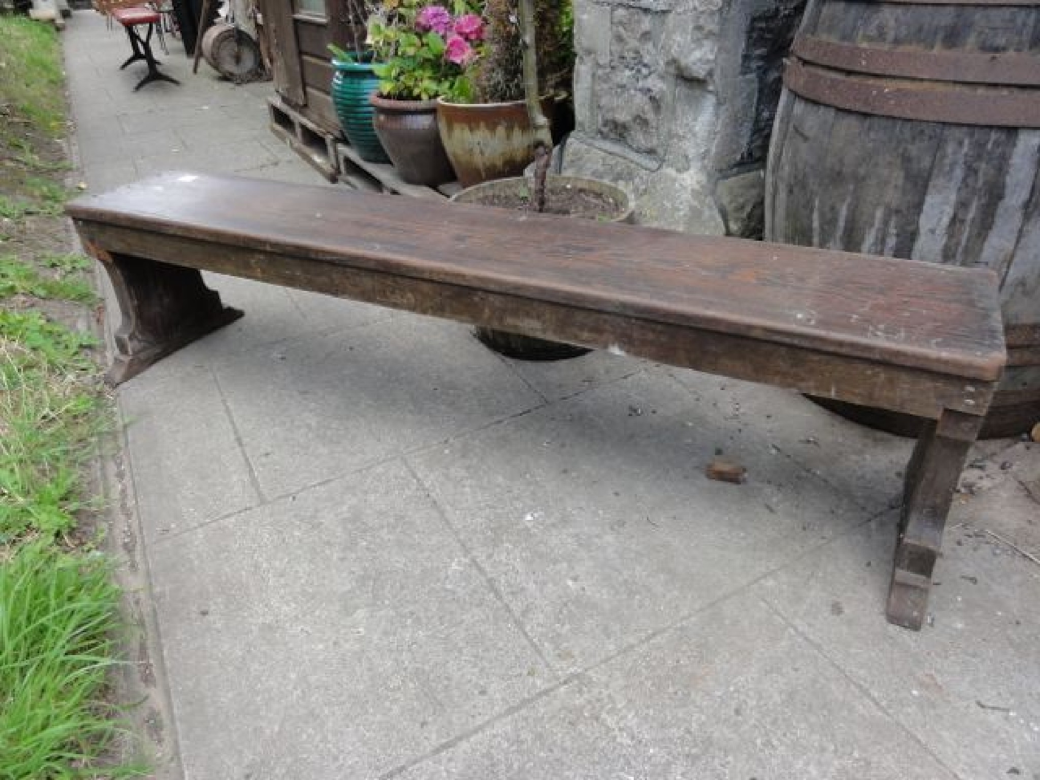 Appraisal: A pair of vintage stained pine benches with plank seats