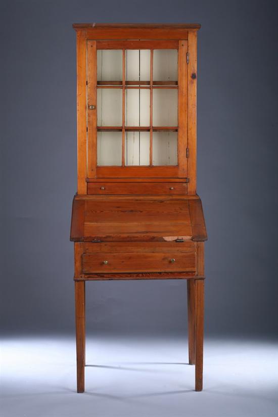 Appraisal: AMERICAN PINE SLANT-FRONT COUNTRY BOOKCASE th century in two parts