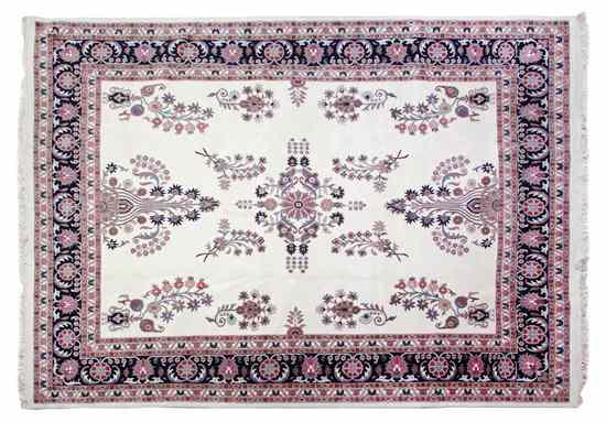 Appraisal: A Kashan Wool Rug having a central medallion surrounded by