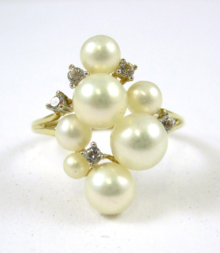 Appraisal: PEARL DIAMOND AND TEN KARAT GOLD RING set with five