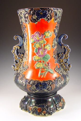 Appraisal: MAJOLICA VASE Heavily embossed leaf and flower design Unmarked ''h