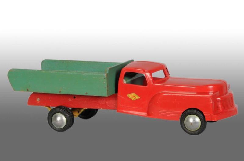 Appraisal: Plastic Wood Cass Truck Toy Description Beautiful decals on doors