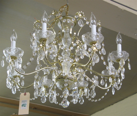 Appraisal: EIGHT-LIGHT CRYSTAL AND GILDED METAL CHANDELIER hung overall with chains