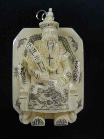 Appraisal: Carved Ivory Pendant of an Emperor on throne polychrome trim