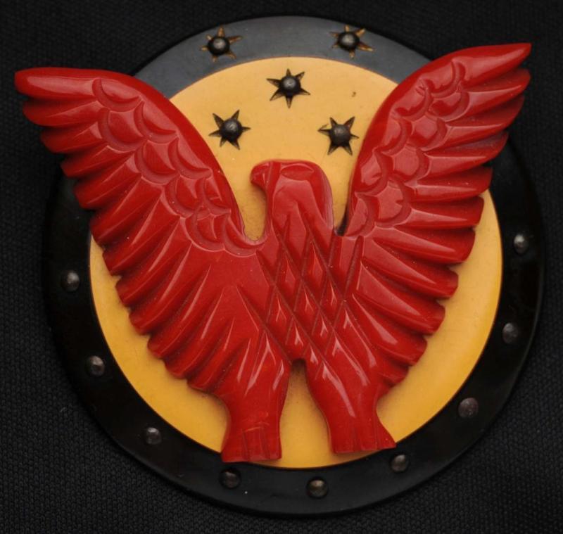 Appraisal: Bakelite -Color Eagle on Shield Pin Condition Excellent Size -