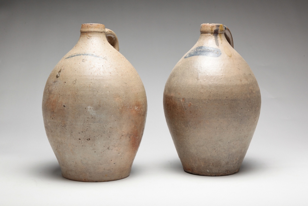 Appraisal: TWO AMERICAN STONEWARE JUGS Ca s Ovoid with applied strap