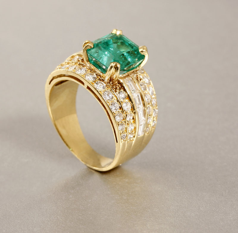 Appraisal: An emerald and diamond ring An emerald and diamond ring