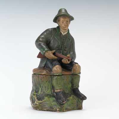 Appraisal: Full Figural Tobacco Jar of a Seated Alpine Hunter Terracotta