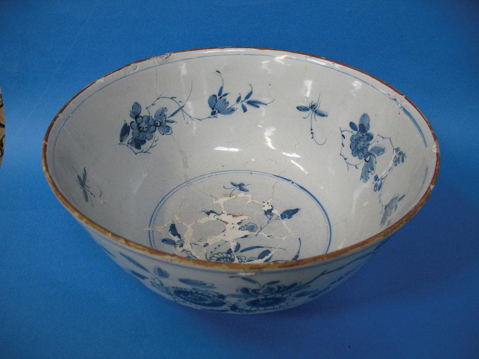 Appraisal: AN ENGLISH DELTWARE BLUE AND WHITE PUNCH BOWL decorated with