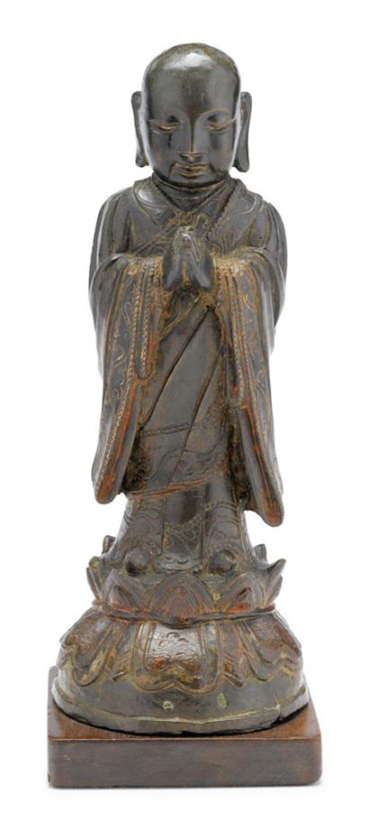 Appraisal: Chinese bronze monk figureming dynasty