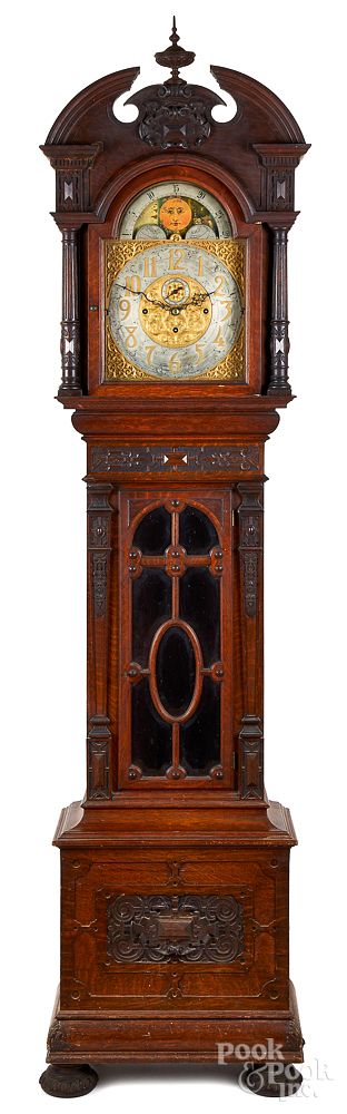 Appraisal: Arts and Crafts oak tall case clock ca Extravagantly carvd