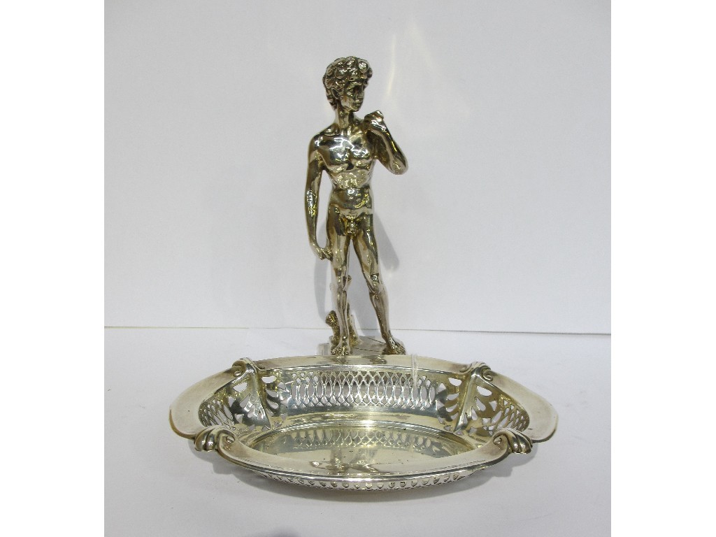 Appraisal: A lot comprising a white metal figure of a naked