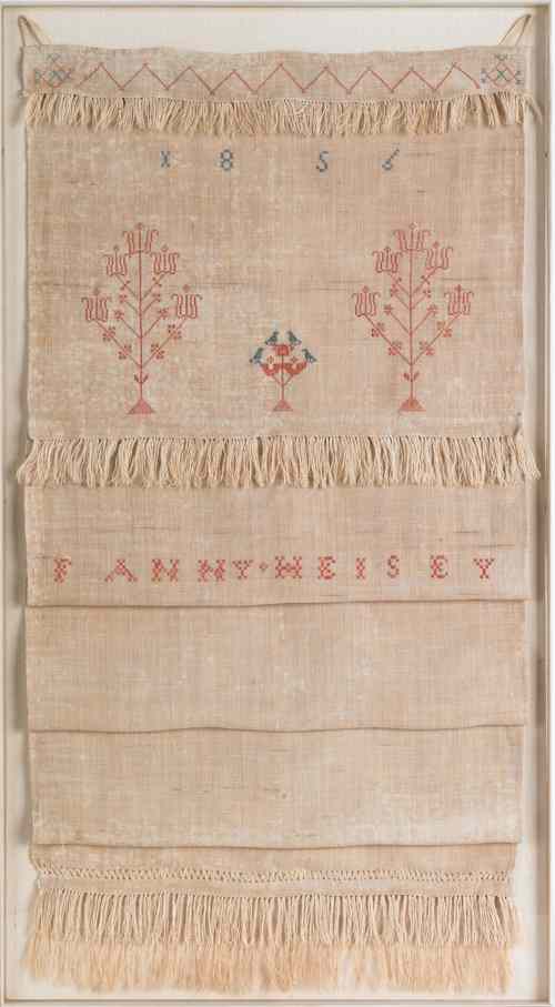 Appraisal: Two framed embroidered linen show towels one inscribed Fanny Heisey