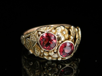 Appraisal: A Garnet and Gold Ring Possibly by Oakes k yellow