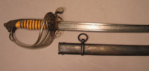 Appraisal: A Mexican officer's sword dated Curved inch blade with double