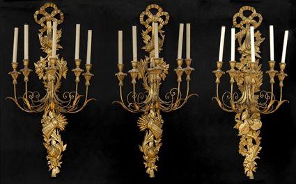 Appraisal: SET OF THREE LOUIS XVI-STYLE GILTWOOD AND GILT-METAL FIVE-LIGHT WALL