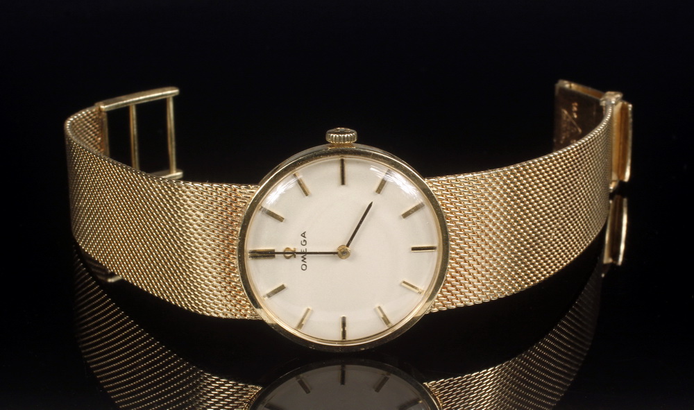 Appraisal: MANS WRISTWATCH - Large Face Omega K yellow gold Wristwatch