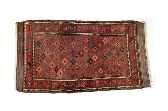 Appraisal: ORIENTAL RUG Early th century Caucasian Geometric border and design