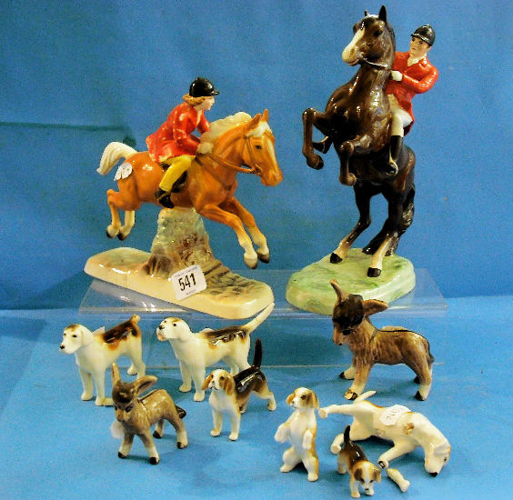 Appraisal: Beswick Huntsman on Rearing Horse three Beswick Foxhounds Girl on