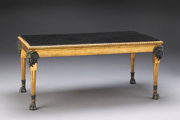 Appraisal: A Neoclassical style parcel gilt and ebonized table first half