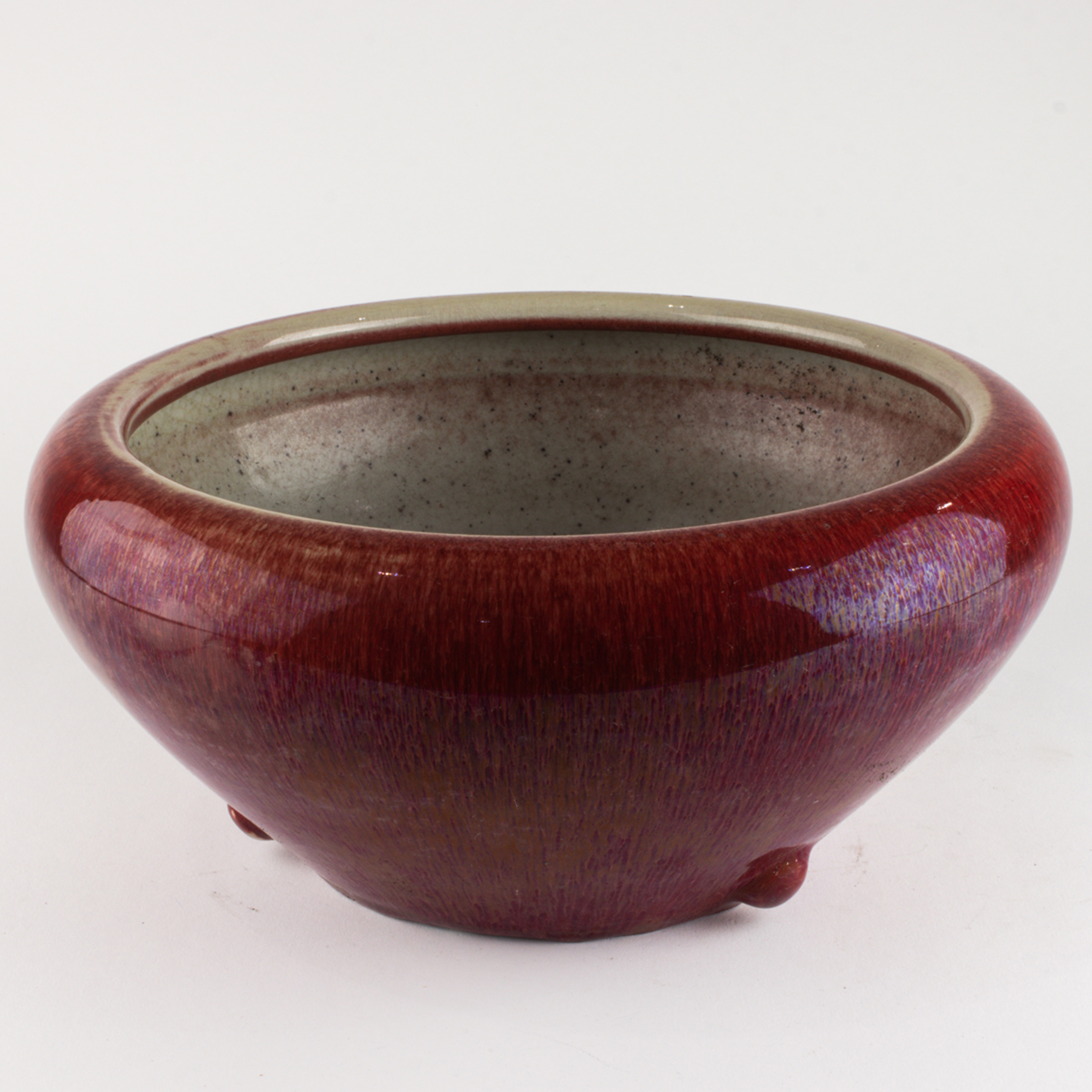 Appraisal: CHINESE OXBLOOD-GLAZED CENSER Chinese oxblood-glazed censer covered in an overall