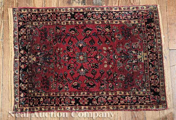 Appraisal: Two Semi-Antique Rugs each with red ground and floral designs