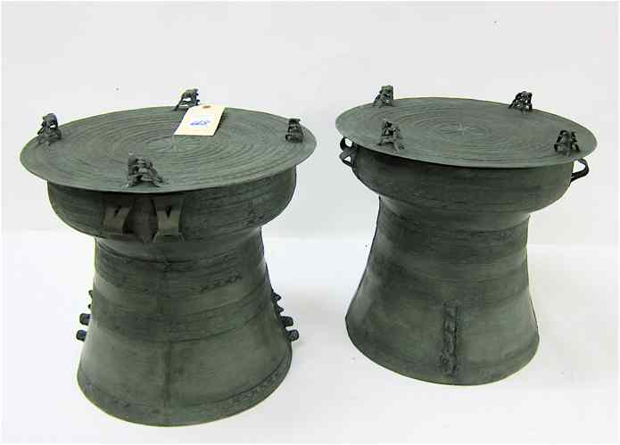 Appraisal: PAIR OF BRONZE RAIN DRUMS individually cast in the manner