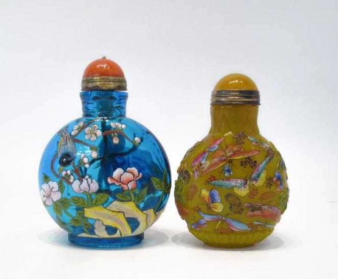 Appraisal: TWO CHINESE GLASS SNUFF BOTTLES the clear blue bottle and