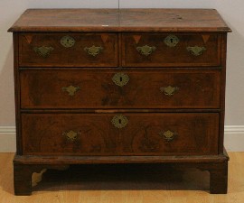 Appraisal: An early th century walnut chest of drawers cm wide